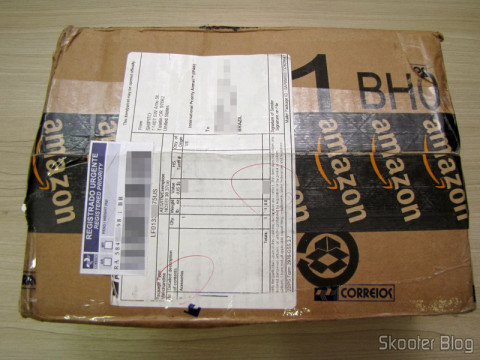Pacote da Amazon coma a Câmera Digital Canon PowerShot ELPH 330 HS 12.1 MP Wi-Fi CMOS Zoom Óptico 10X Lentes 24mm Video Full HD 1080p com cartão de memória 32GB, bolsa e bateria extra