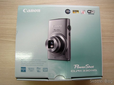 Amazon via Shipito: Câmera Digital Canon PowerShot ELPH 330 HS 12.1 MP Wi-Fi CMOS Zoom Óptico 10X Lentes 24mm Video Full HD 1080p (Canon PowerShot ELPH 330 HS 12.1 MP Wi-Fi Enabled CMOS Digital Camera with 10x Optical Zoom 24mm Wide-Angle Lens and 1080p Full HD Video (Black)) 15 Câmera Digital Canon PowerShot ELPH 330 HS 12.1 MP Wi-Fi CMOS Zoom Óptico 10X Lentes 24mm Video Full HD 1080p (Canon PowerShot ELPH 330 HS 12.1 MP Wi-Fi Enabled CMOS Digital Camera with 10x Optical Zoom 24mm Wide-Angle Lens and 1080p Full HD Video (Black)), em sua embalagem