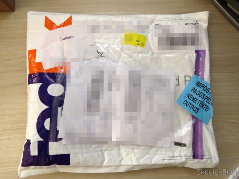 Pacote do Fedex com meu Óculos G4U 79012 com Lentes 1.56 Fotocromáticas Cinza da Goggles4U