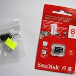 DealExtreme: Conversor de plugs de 2.5mm para 3.5mm e Cartão micro SD Sandisk Genuíno de 8GB Conversor de plugs de 2.5mm para 3.5mm (2.5mm Male to 3.5mm Female Convertor) e Cartão micro SD Sandisk Genuíno de 8GB (Genuine SanDisk MicroSD/TransFlash TF Memory Card (8GB))