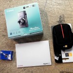 Câmera Digital Canon PowerShot ELPH 330 HS 12.1 MP Wi-Fi CMOS Zoom Óptico 10X Lentes 24mm Video Full HD 1080p com cartão de memória 32GB, bolsa e bateria extra, em foto tirada pela Shipito