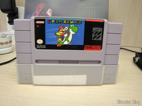 Cartucho Super Mario World que acompanha o Super Nintendo