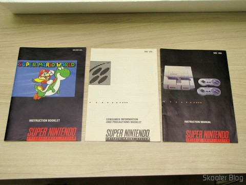 Manuais do Super Mario World e do Super Nintendo