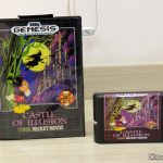Cartucho de Mega Drive da AliExpress: Castle of Illusion starring Mickey Mouse, e sua caixinha.Cartucho de Mega Drive da AliExpress: Castle of Illusion starring Mickey Mouse, e sua caixinha.