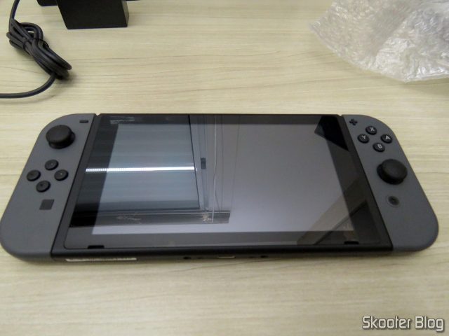 Nintendo Switch com Joy-Con acoplado.