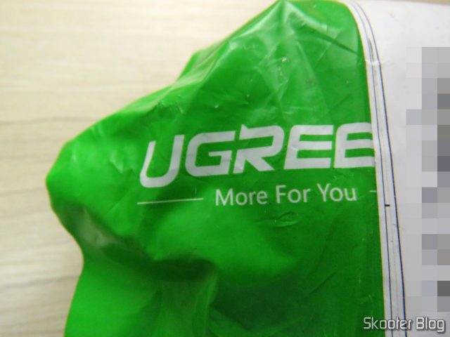 Pacote com o Suporte de Celular para Carro Ugreen para Saída de Ar e o Adaptador de Mini DisplayPort para HDMI Ugreen.