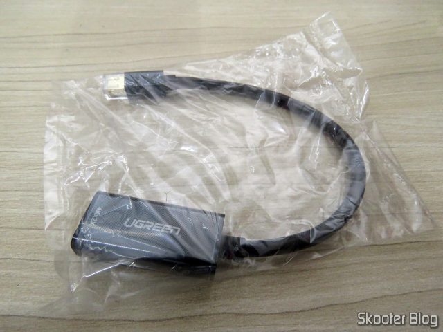 Adaptador de Mini DisplayPort para HDMI Ugreen, em sua embalagem.