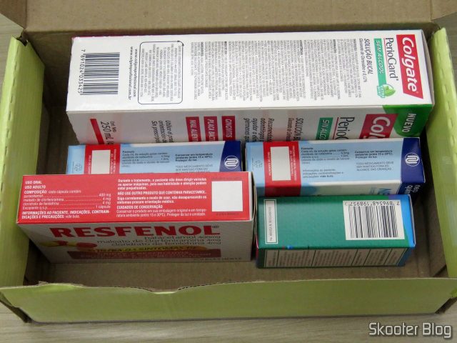 Caixinha da Drogaria Nova Esperança, com Periogard, Systane, Resfenol e 2 Neosoro.