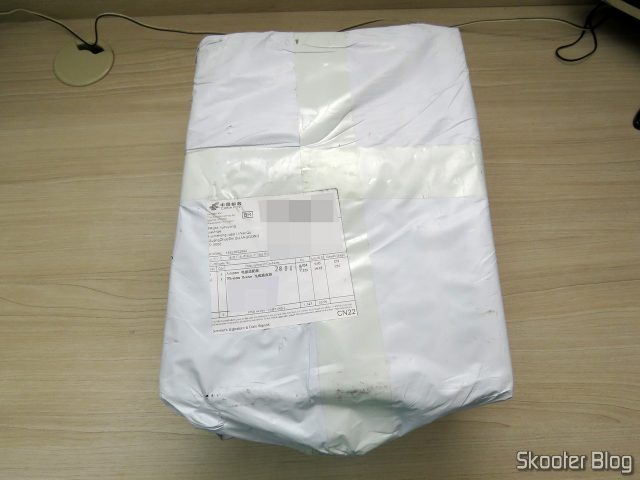 Pacote com o Roteador ASUS RT-AC86U.