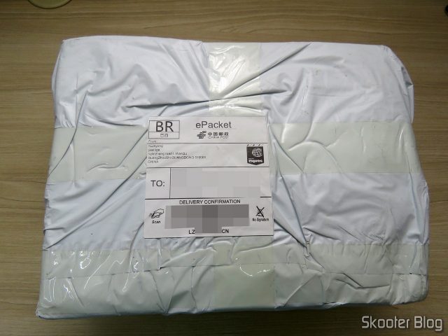 Pacote com o Roteador ASUS RT-AC86U.