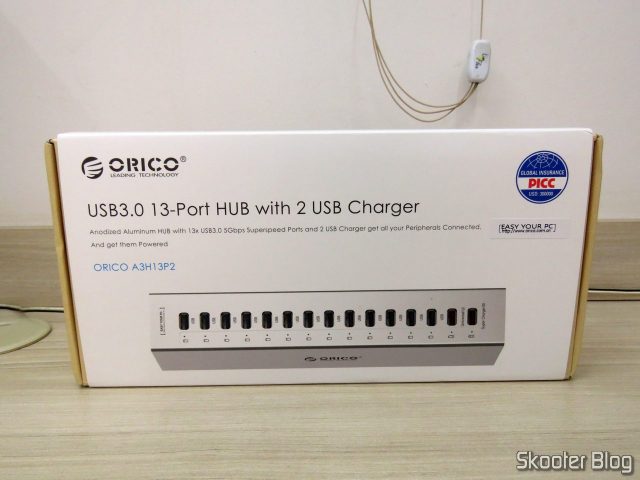 Hub USB 3.0 Orico A3H13P2, em sua embalagem.