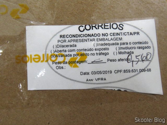 Aviso do Correios que o pacote foi recondicionado por apresentar embalagem avariada por atrito no tráfego.
