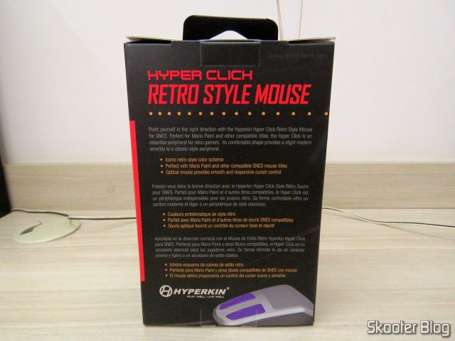 Mouse Óptico para Super Nintendo Hyperkin Click Retro Style Mouse, em sua embalagem.