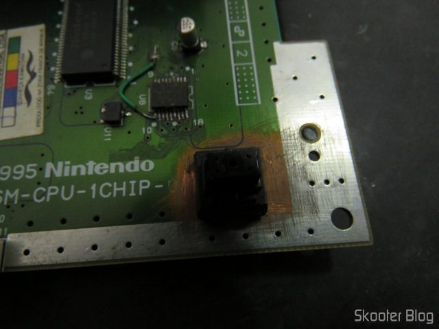 Placa toda lixada em torno do RESET.