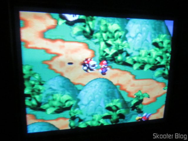 SD2SNES Pro Deluxe em funcionamento no Super Nintendo.