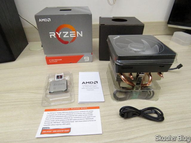 Processador AMD Ryzen 9 3900X 12 núcleos, 24 threads, e seus acessórios.