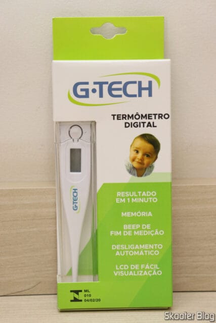 Termômetro Digital Clínico Branco G-Tech TH1027, em sua embalagem.