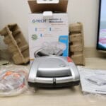 Inalador e Nebulizador G-Tech Nebcom V, com embalagem e acessórios.