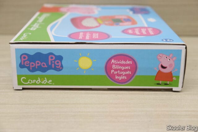 Laptop Infantil Educativo Peppa Pig Bilíngue Candide, em sua embalagem;
